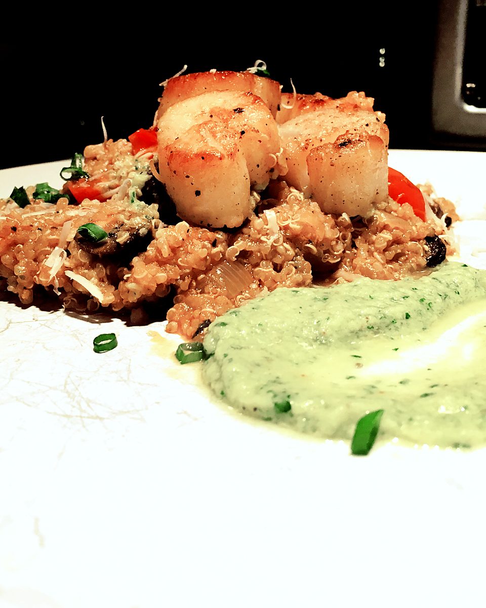 Seared scallops on quinoa with an herb pur&eacute;e